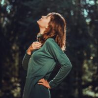 selective focus photo of woman looking up
