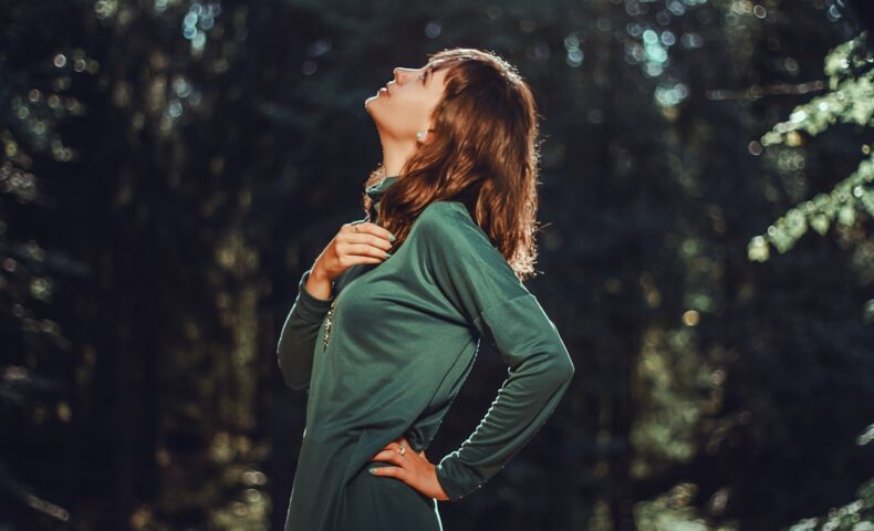 selective focus photo of woman looking up